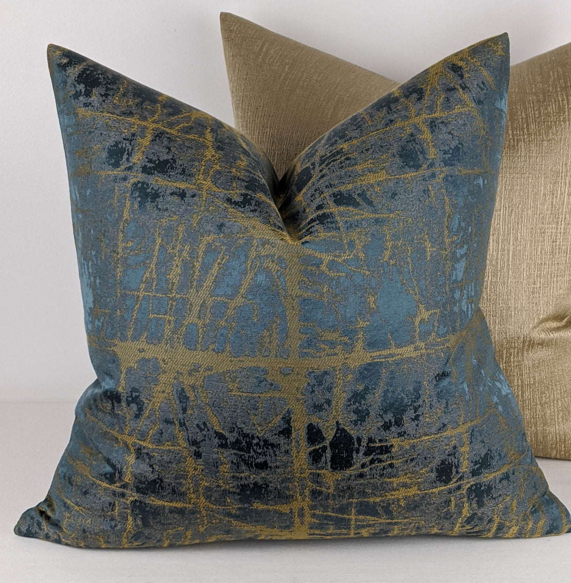 Gold and teal clearance cushions